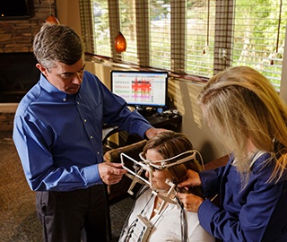 Dr. Olsen with a patient