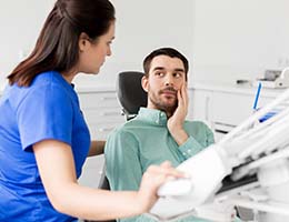 Emergency dentist in Ann Arbor helping a patient