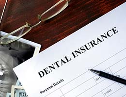 Dental insurance form resting on a table