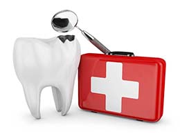 Diagram of a model tooth next to a medical kit