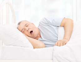 a person snoring while asleep