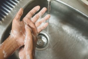 dentist in Ann Arbor washing their hands