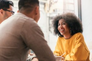 a person talking with friends